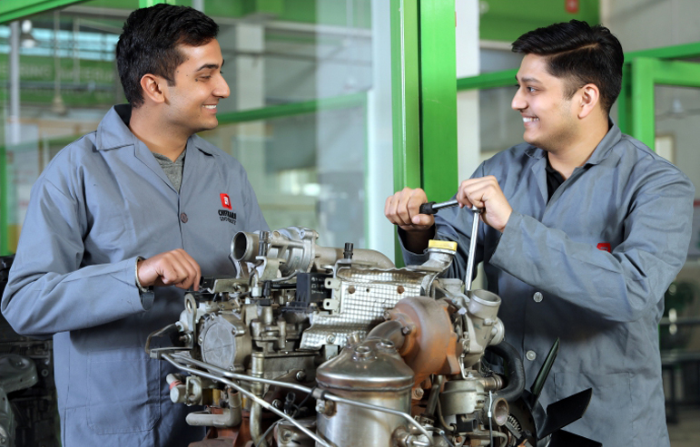 the illustration shows the two mechanical engineering students from chitkara university looking at each other.
